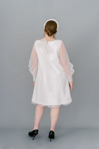 Short simple wedding dress in crepe with tulle poet sleeves. By Catherine Langlois, made in Canada.