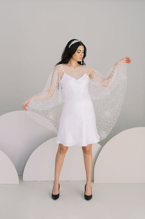 Celestial beaded bridal cape. Waist length in front, knee length in back. Handmade by Catherine Langlois, Toronto, Canada.
